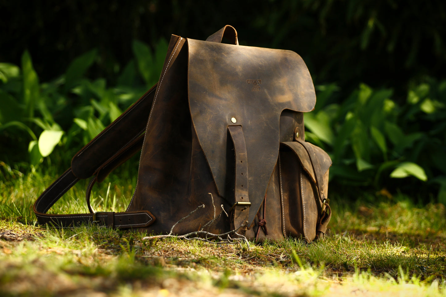 "Asymetric" leather backpack