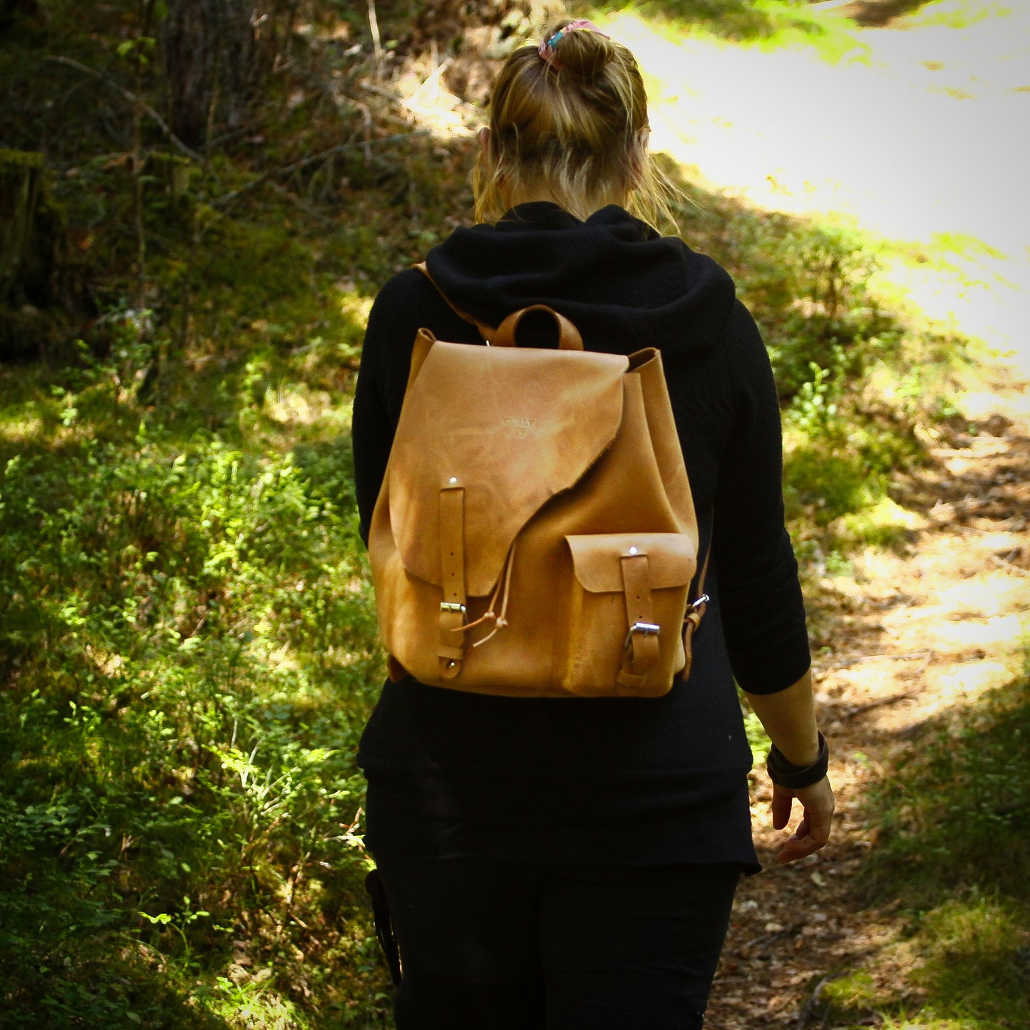 "Asymetric" leather backpack